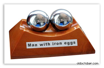 Man with iron eggs.jpg